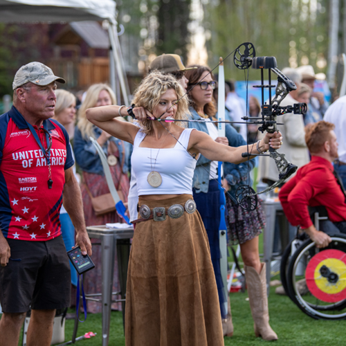 Bullseye Roundup Event woman doing archery