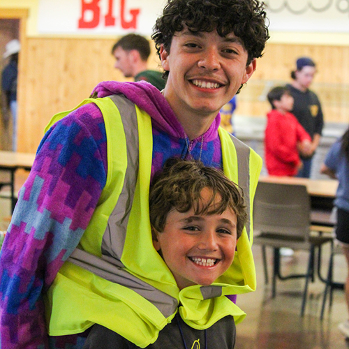Camper and counselor being goofy