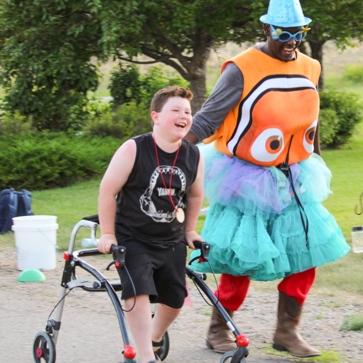 camper and counselor enjoying their time at camp.