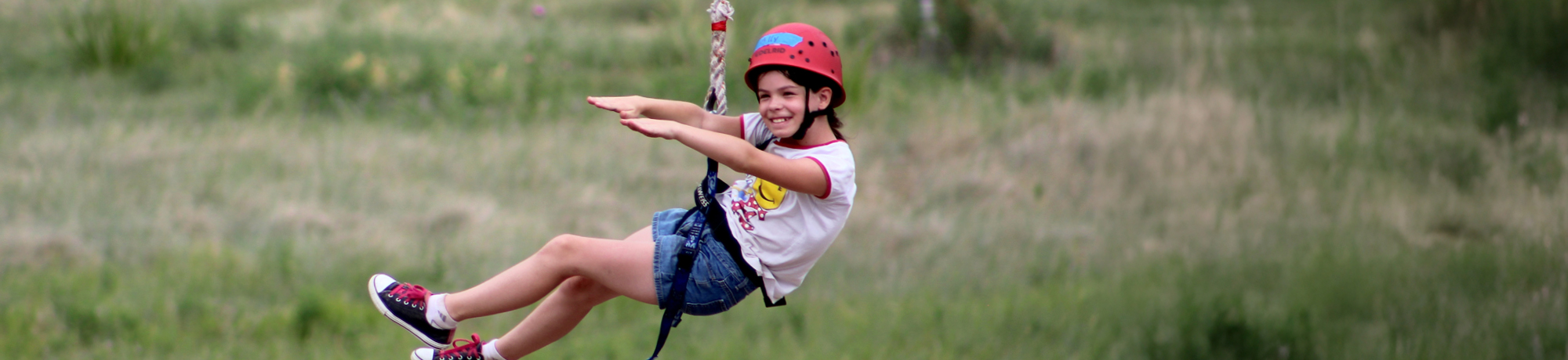 camper on zip line