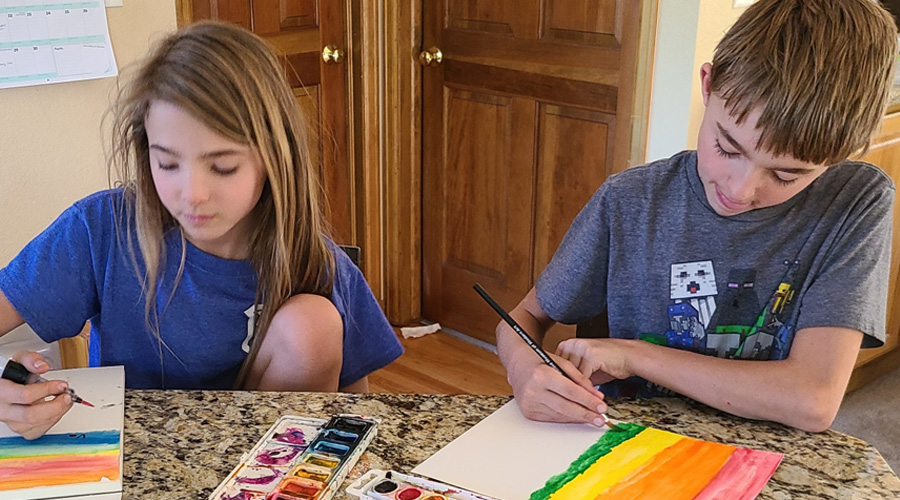 campers painting at home using their Joy, Delivered boxes