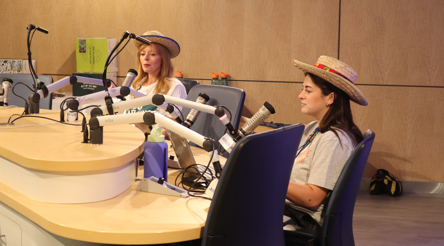 two women broadcasting at Seacrest Studios