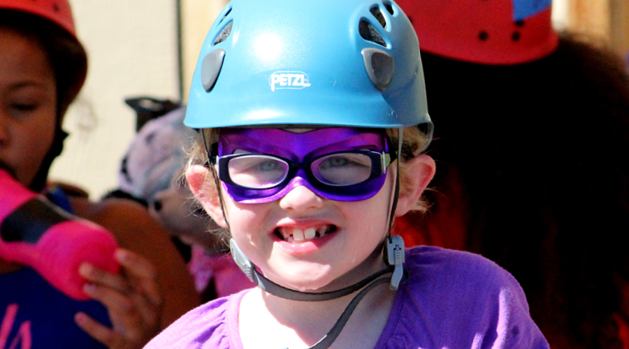 camper with purple glasses on