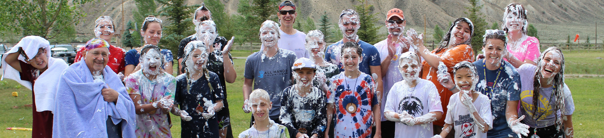 campers with shaving cream all over them