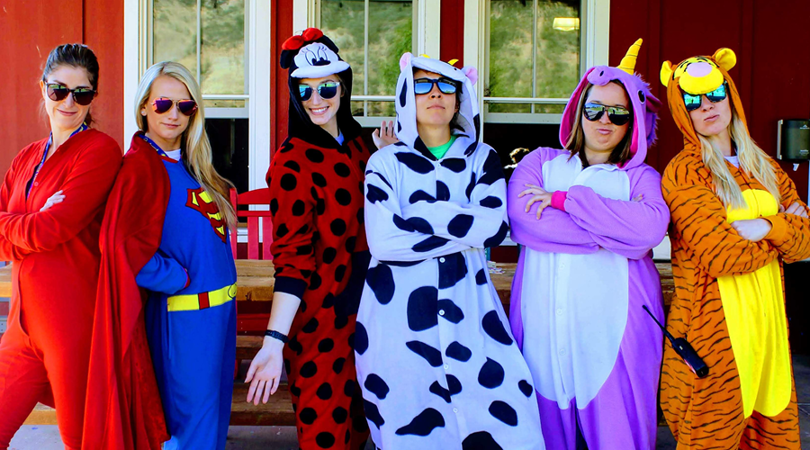 staff and volunteers posing in fun costumes